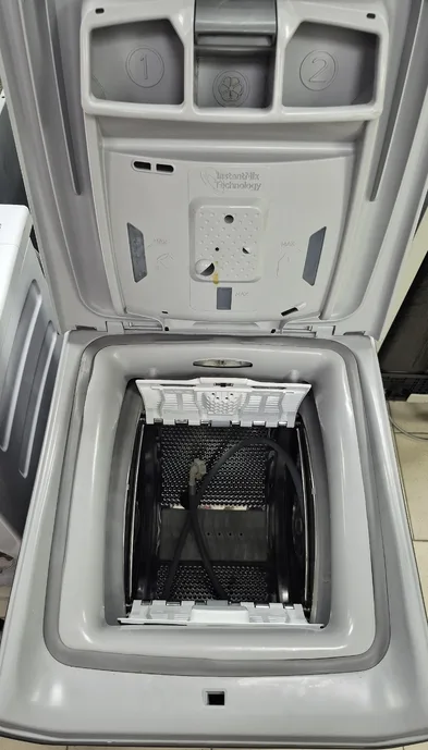 Стиральная машина с вертикальной загрузкой Haier RTXS G584TMHR-07